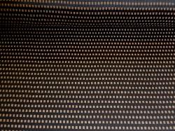 Pattern Linden Color Espresso Upholstery Fabric on cutting table