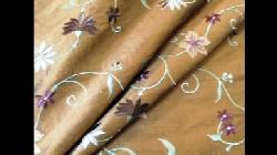 Click for video and image page of Silk Dupioni Cellini color Toast with embroidery fabric from World Wide Fabrics, delicate`floral pattern, for home decorating and interior design