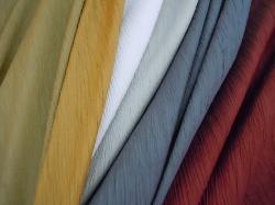 Crinkle Faux Silk Curtain Drapery Fabric from P Kaufmann Fabrics, polyester, Colors Rattan, Amber, Snow, Silver, Graphite and Claret