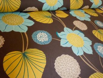 a Prestigious Textiles Interior Decorating Floral Pattern Name Delilah printed in the UK, in colors brown, yellow aqua, blue and tan