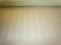 Braemore Leaf Stripe color Mist Eyelet SemiSheer Drapery Fabric on cutting table