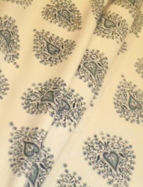 Draped curtain image of Pattern 0955 Woodrose Decorator Fabric a Laura & Kiran fabric, Woodrose Color China Blues handprint pattern